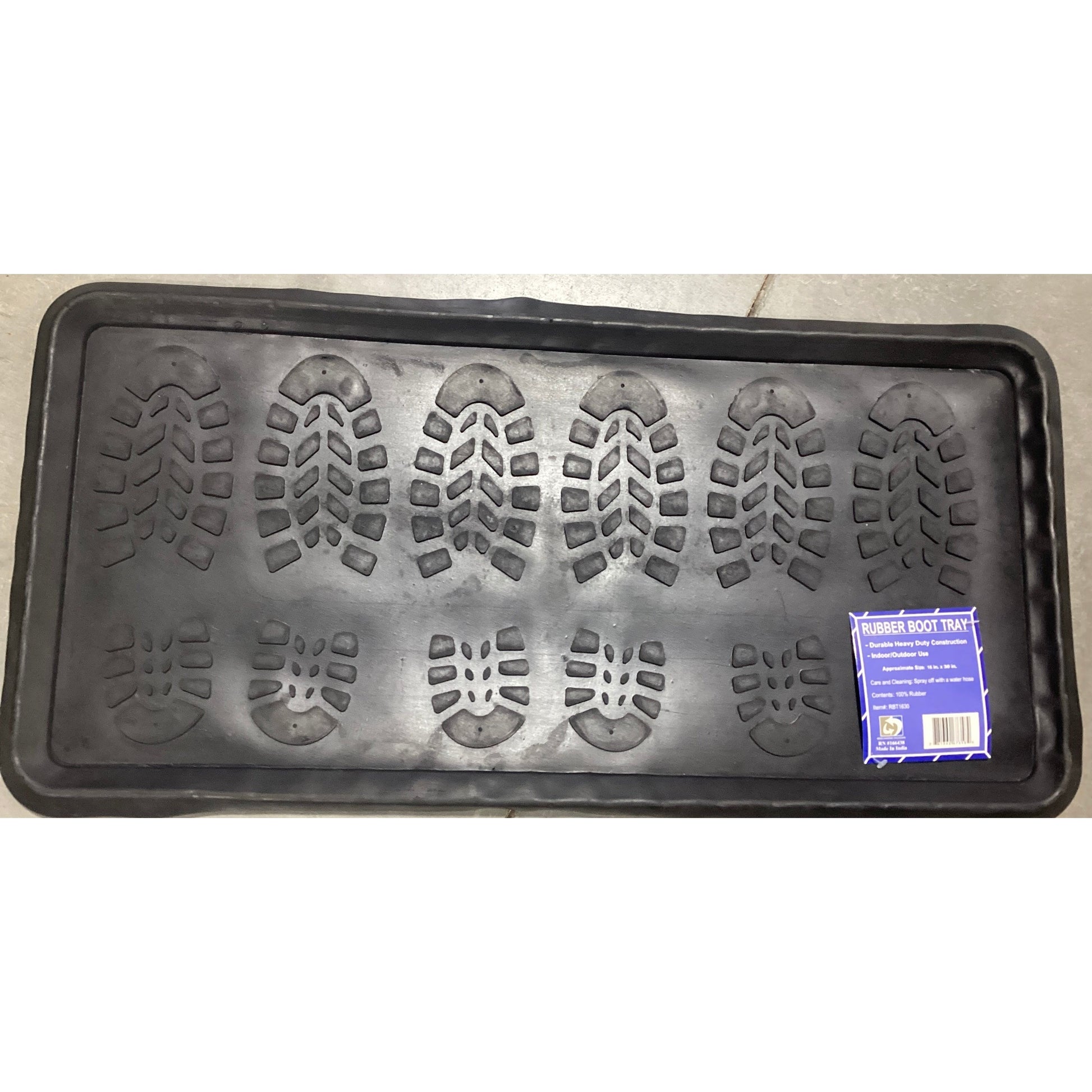 A black rubber tray with a picture of shoes, designed for holding boots and preventing dirt and water from spreading.