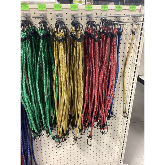 A rack with various colored Bungee Cords.